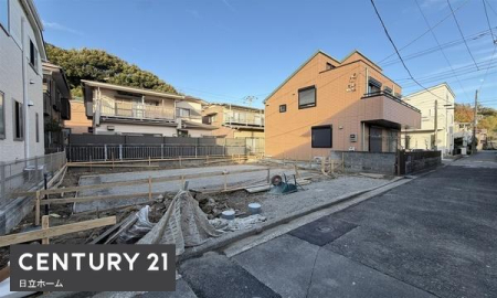 �_�ސ쌧���l�s�����哹1���ڂ̐V�z��ˌ��Ă̑O�ʓ��H�܂ތ��n�ʐ^