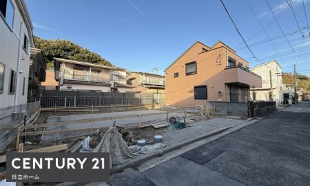 �_�ސ쌧���l�s�����哹1���ڂ̐V�z��ˌ��Ă̑O�ʓ��H�܂ތ��n�ʐ^