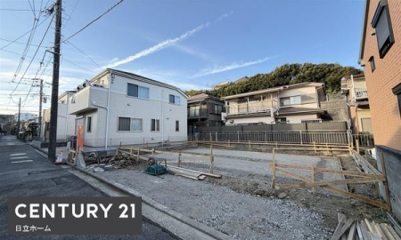 �_�ސ쌧���l�s�����哹1���ڂ̐V�z��ˌ��Ă̑O�ʓ��H�܂ތ��n�ʐ^