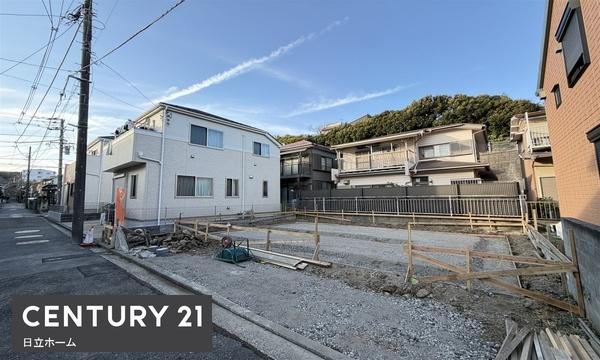 �_�ސ쌧���l�s�����哹1���ڂ̐V�z��ˌ��Ă̑O�ʓ��H�܂ތ��n�ʐ^