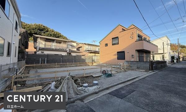 �_�ސ쌧���l�s�����哹1���ڂ̐V�z��ˌ��Ă̑O�ʓ��H�܂ތ��n�ʐ^