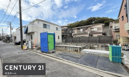 �_�ސ쌧���l�s�����哹1���ڂ̐V�z��ˌ��Ă̑O�ʓ��H�܂ތ��n�ʐ^