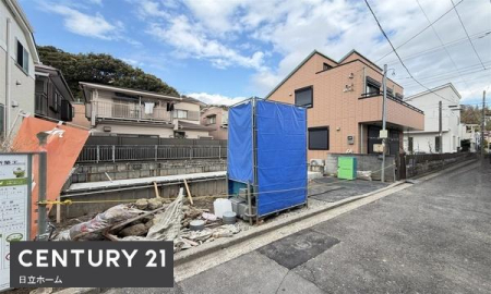 �_�ސ쌧���l�s�����哹1���ڂ̐V�z��ˌ��Ă̑O�ʓ��H�܂ތ��n�ʐ^