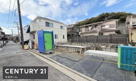 �_�ސ쌧���l�s�����哹1���ڂ̐V�z��ˌ��Ă̑O�ʓ��H�܂ތ��n�ʐ^