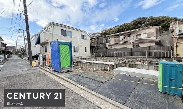 �_�ސ쌧���l�s�����哹1���ڂ̐V�z��ˌ��Ă̑O�ʓ��H�܂ތ��n�ʐ^