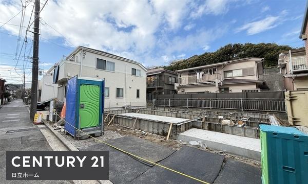 �_�ސ쌧���l�s�����哹1���ڂ̐V�z��ˌ��Ă̑O�ʓ��H�܂ތ��n�ʐ^