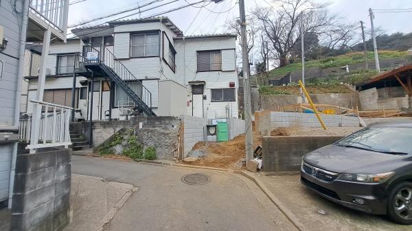 �_�ސ쌧���l�s�_�ސ�攒�������̐V�z��ˌ��Ă̑O�ʓ��H�܂ތ��n�ʐ^