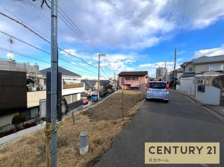 �_�ސ쌧���l�s����񖓐�1���ڂ̐V�z��ˌ��Ă̑O�ʓ��H�܂ތ��n�ʐ^