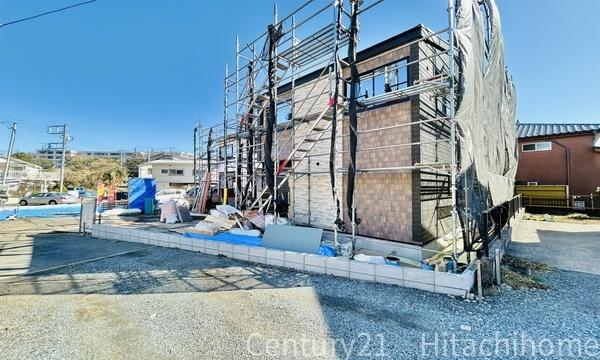 �_�ސ쌧���l�s���掛�v�ۂ̐V�z��ˌ��Ă̑O�ʓ��H�܂ތ��n�ʐ^