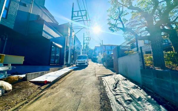 �_�ސ쌧���l�s���剪1���ڂ̐V�z��ˌ��Ă̑O�ʓ��H�܂ތ��n�ʐ^