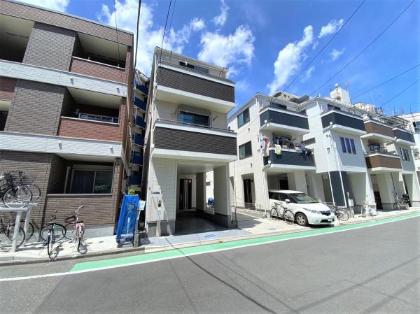 �_�ސ쌧���s����l��1���ڂ̒��È�ˌ��Ă̑O�ʓ��H�܂ތ��n�ʐ^